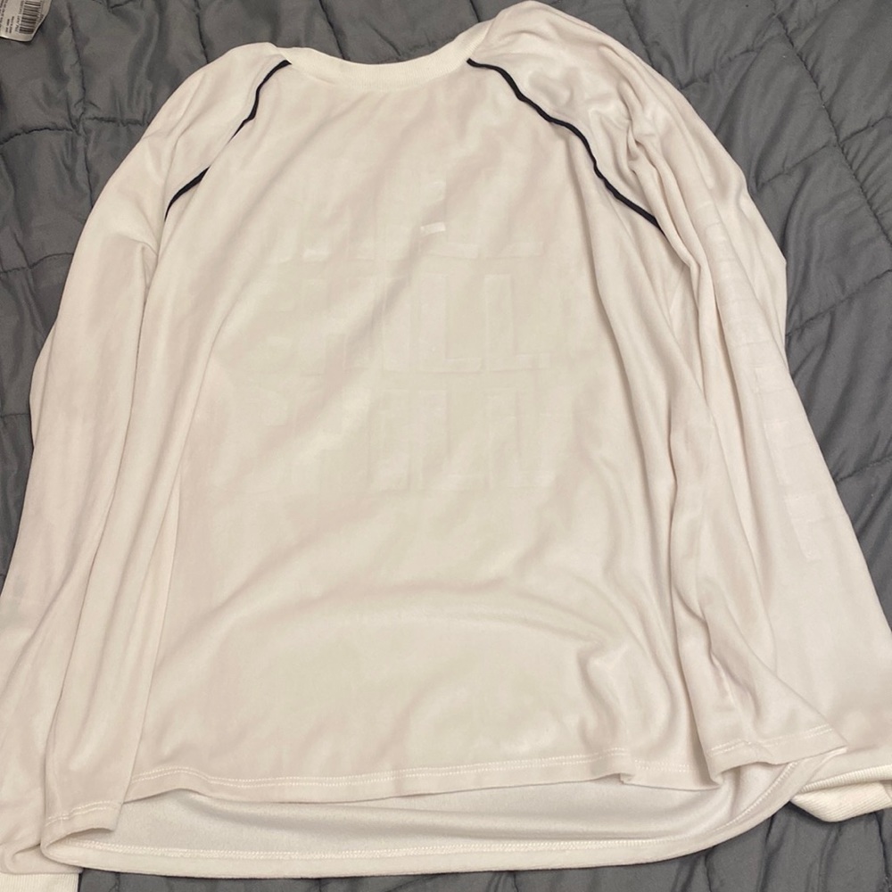 Very soft says chill on it. No boundaries, brand and white and black.